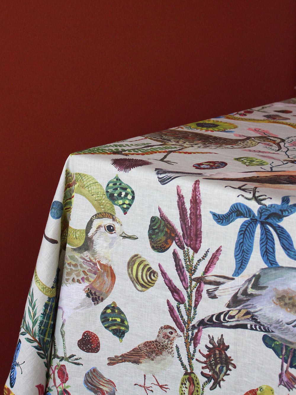 Close-up of Avenida Home Birds in the Dunes linen tablecloth