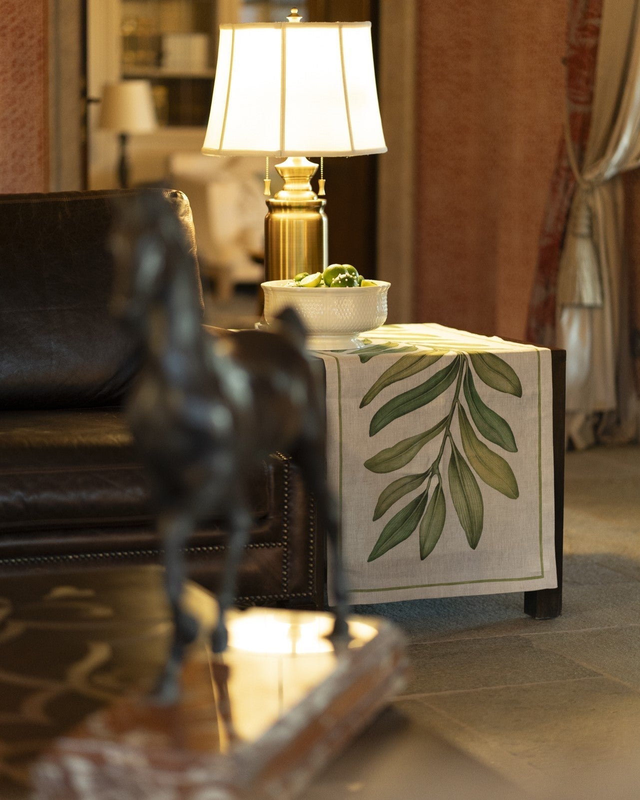 Tamarindo linen table runner styled on a side table