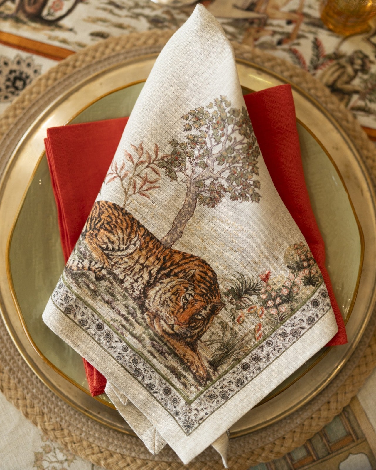 Mudra tiger linen napkin styled on a place setting